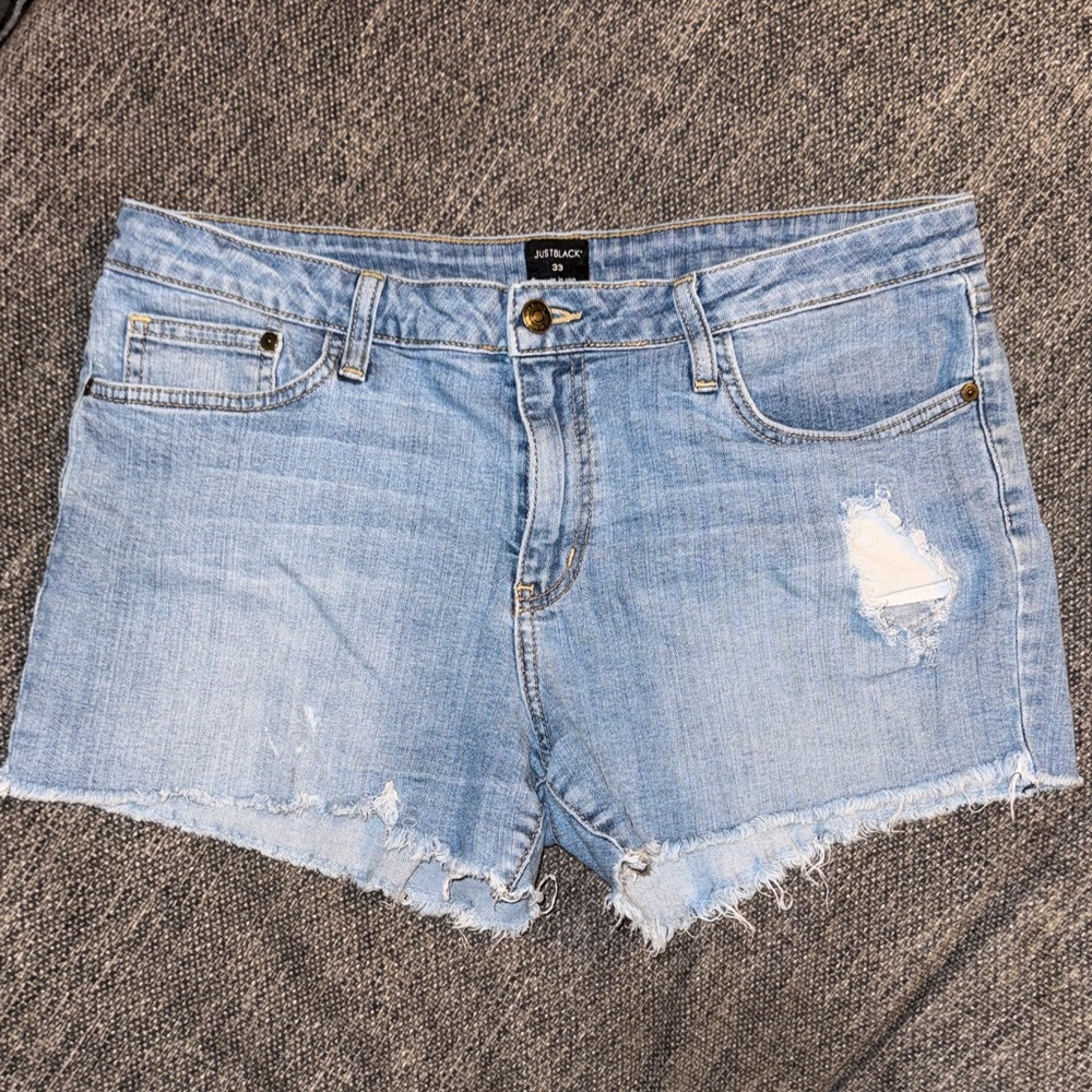 “Just Black” Light Blue Distressed Jean Shorts